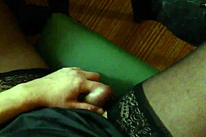 shemale teases cock hard while stroking in sheer stockings