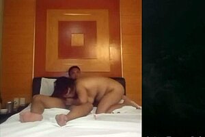 Chubby Asian girlfriend squirts wet from fingering her saggy tits belly out