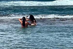 Two Stunning Brazilian Brunettes Kiss and Caress on Pristine Coral Beach Paradise