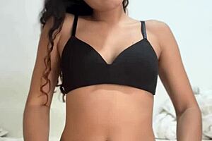 petite young babe fingers pussy softly to ease her building tension