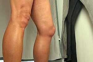 guy strokes huge cock in public fitting room 😈🍆