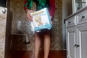 look at this sexy nerdy diaper girl peeing into her tight wet dress and b diaper close up